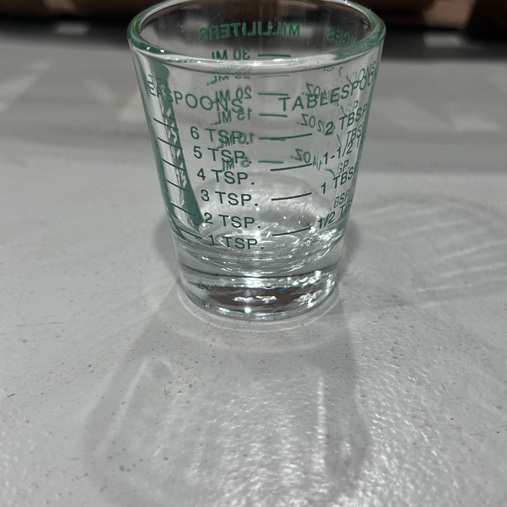 Glass Measuring Shot with Green Measurement Markings